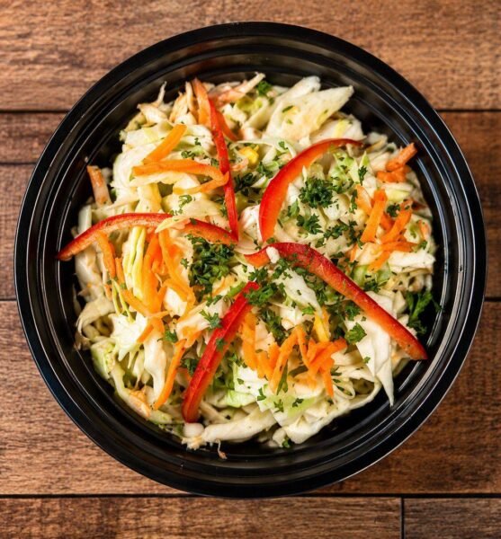 Cabbage salad with carrot, red pepper and parsley