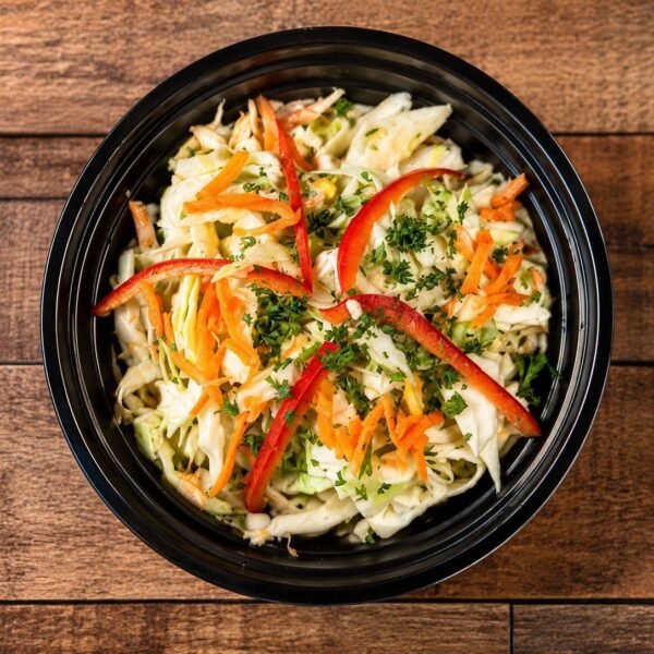 Cabbage salad with carrot, red pepper and parsley