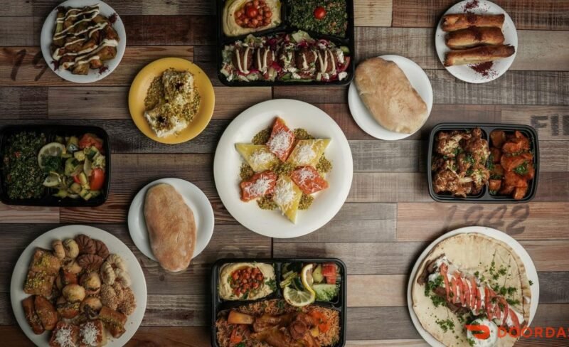 Catering Spread Mediterranean catering spread with mezze, salads, plates and desserts