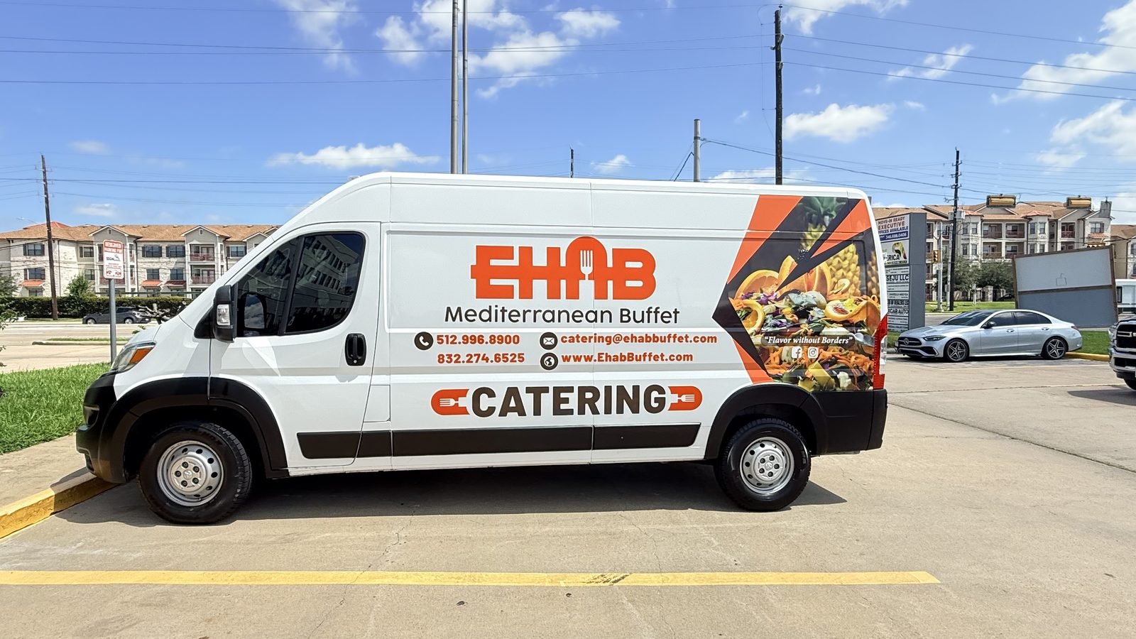 Ehab Mediterranean Buffet catering van with the full menu wrap